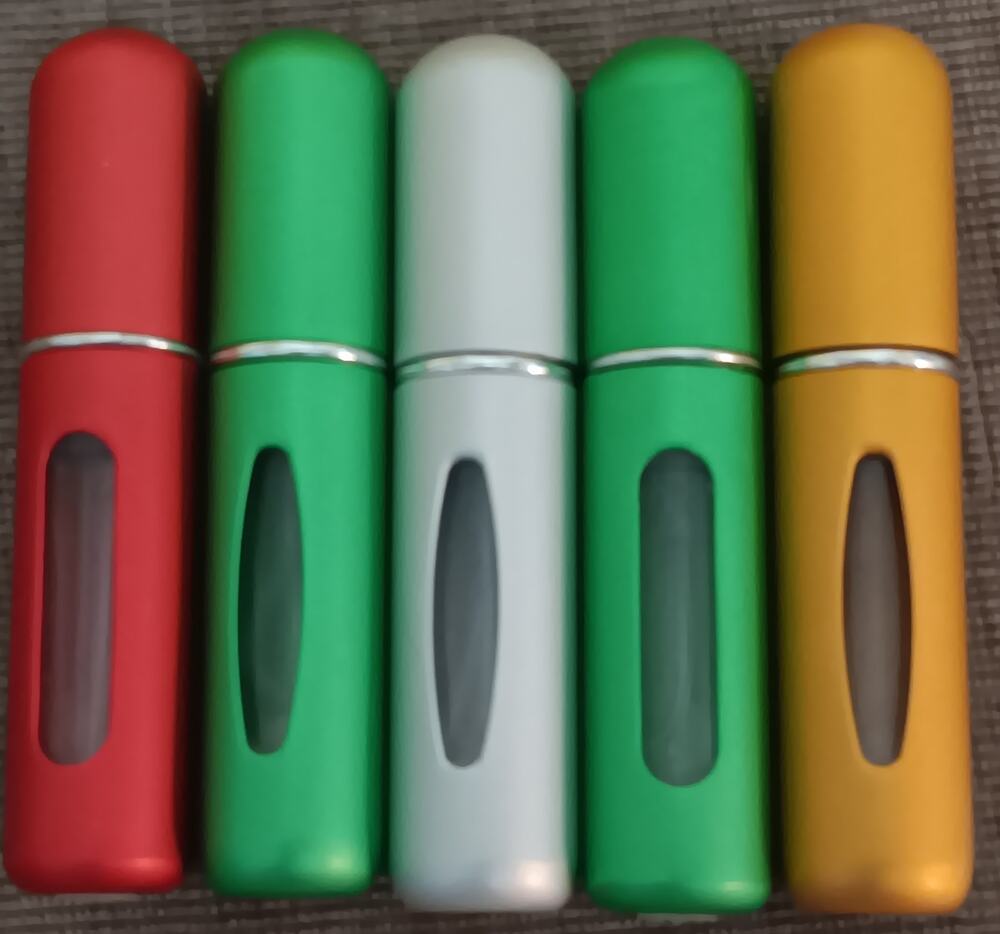 Refillable perfume travel atomizers multi-colored portable containers. (5 NEW)